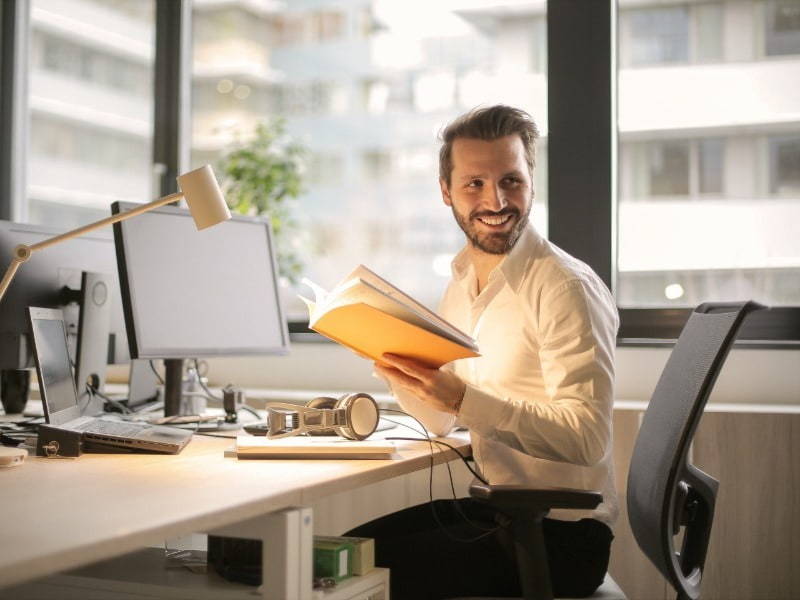 Accountant smiling at work